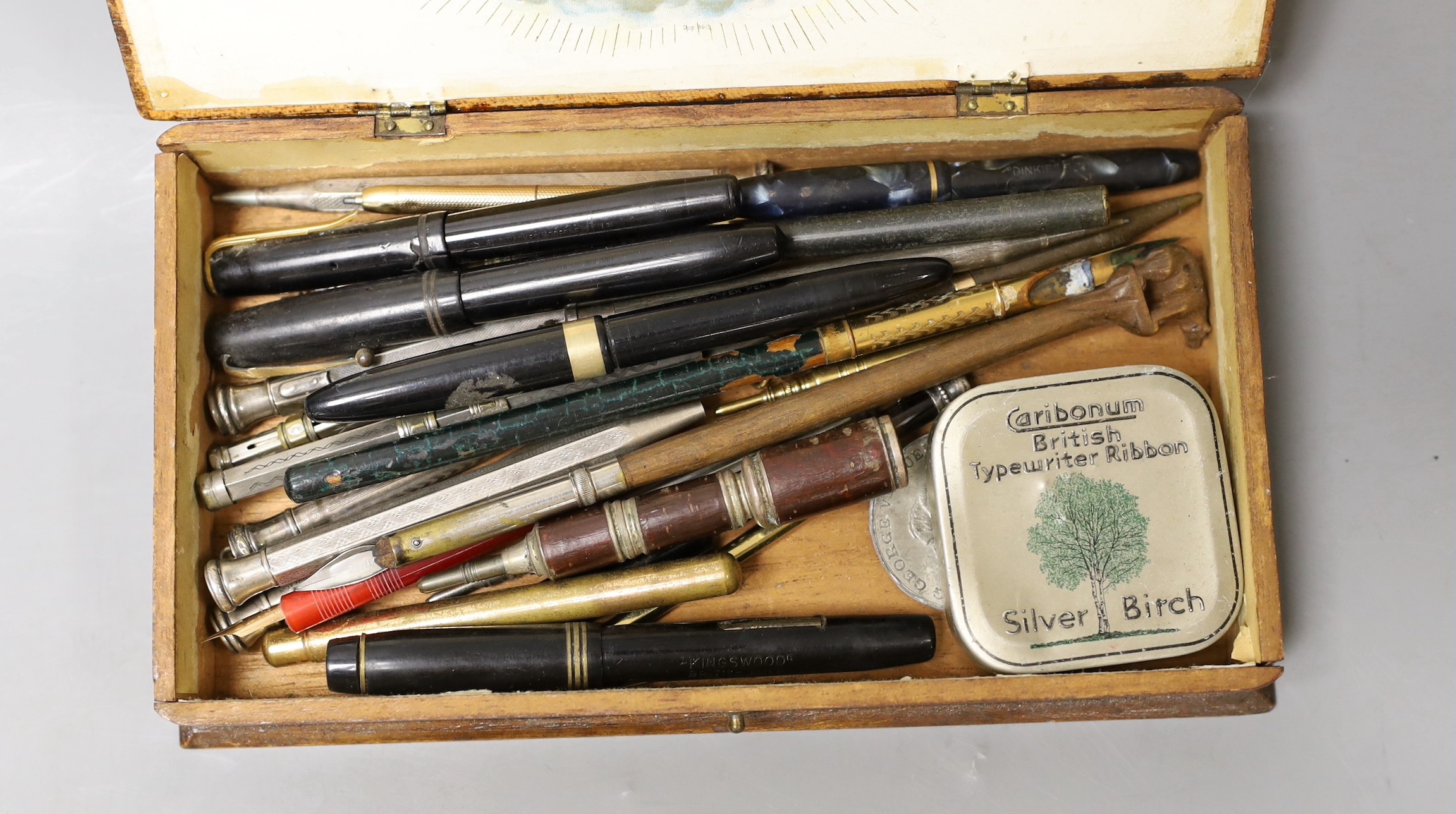 A quantity of various pens and pencils including some silver and one with 9ct gold banding